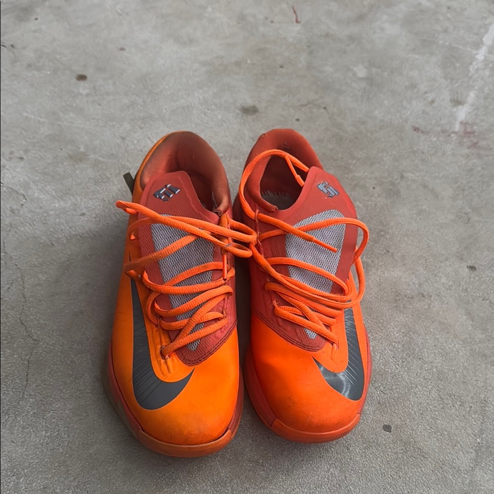 Nike Orange Athletic Shoes with Synthetic Upper and Low-Cut Design